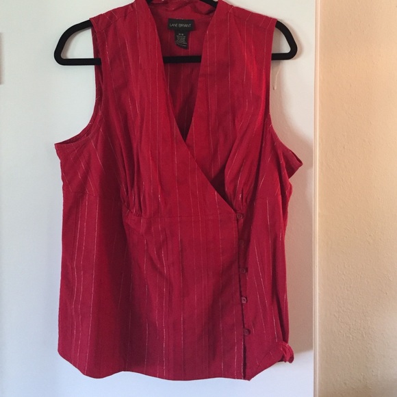 Red sleeveless shirt v neck button down .