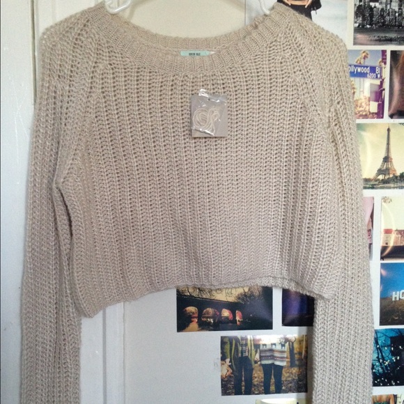 Urban Outfitters Sweaters - Cream colored cropped sweater