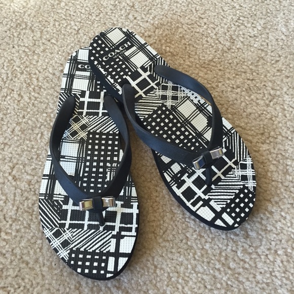 Coach black/white flip flops with silver bow