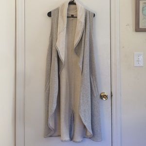 Long sweater vest.