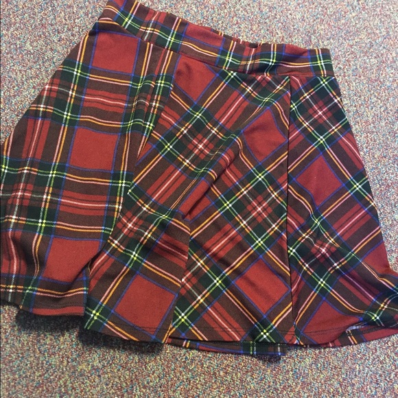 Red plaid school girl skirt .
