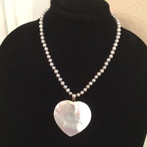 Mother of pearl pendant with pearl necklace