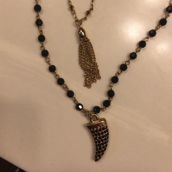 French horn and tassel necklace