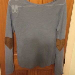 Sweater with heart patches on elbows