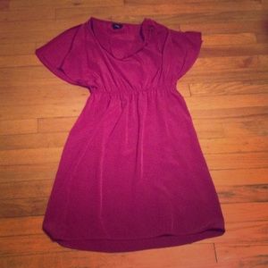 Purple thigh length dress