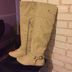 Taupe buckled over the knee boot