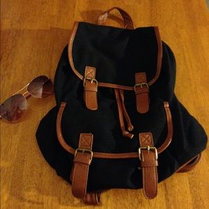 Brand new Black Backpack with Brown Leather straps