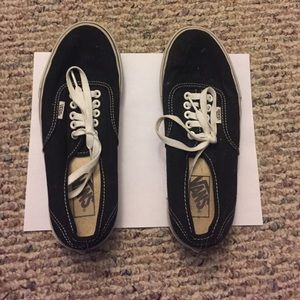 Black Vans sneakers worn a handful of times