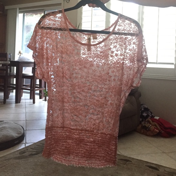 See through pink blouse