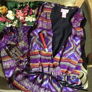 She's cool purple jumpsuit