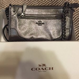 Granite colored Leather NWT Coach crossbody bag.