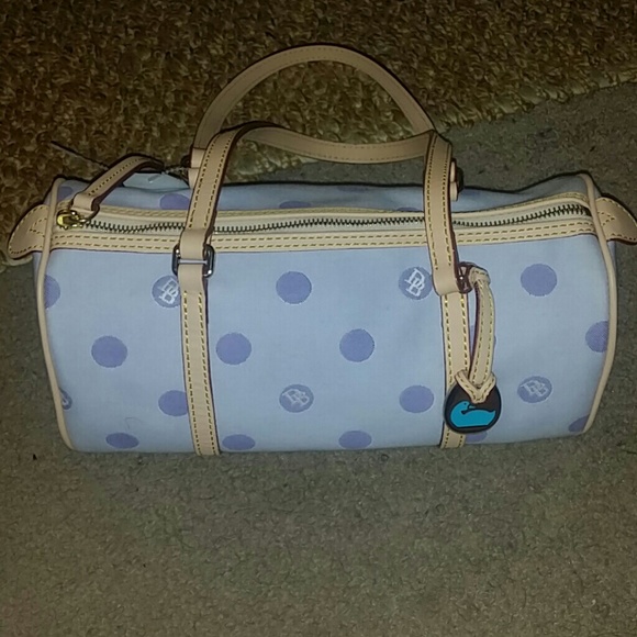 Dooney and bourke bag. Lilac with tan trim.