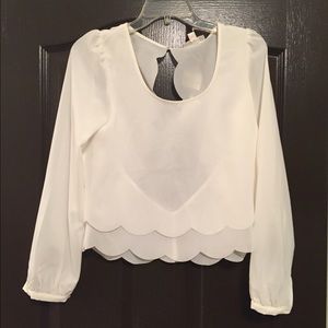 White cropped blouse.