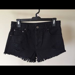 Black denim shorts