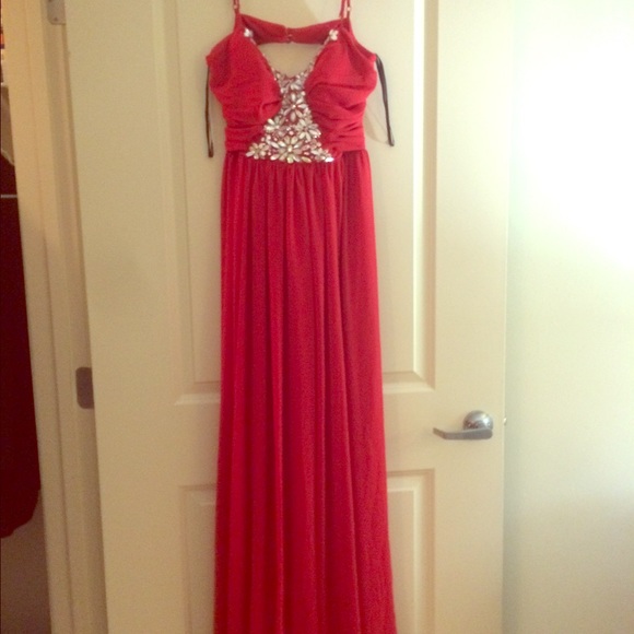 Long red bejeweled prom dress