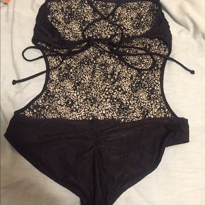 One piece reversible swim suit