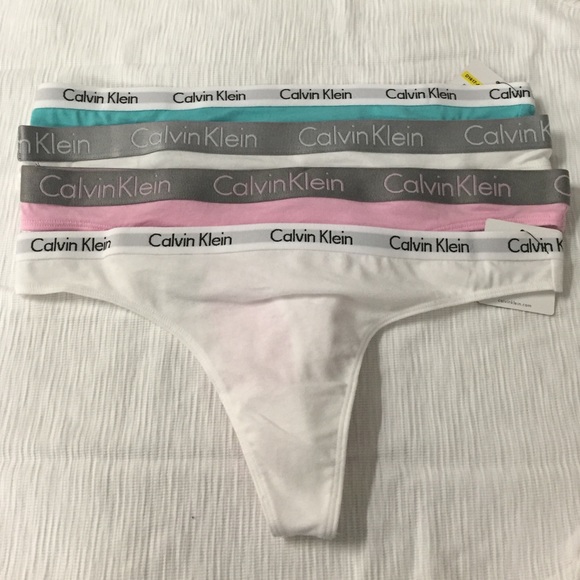 4 Calvin Klein logo thongs