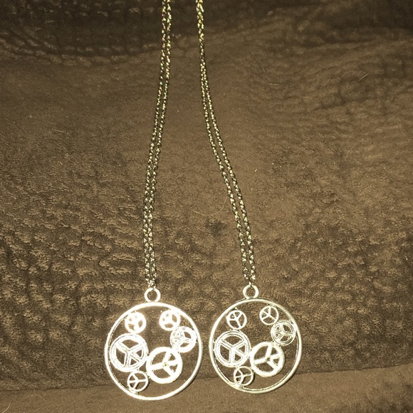 2 peace sign necklaced