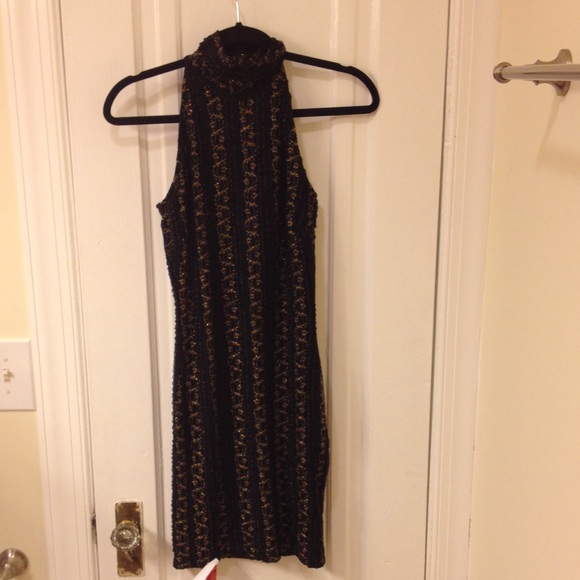 Beautiful halter dress Torn by Ronny Kobo