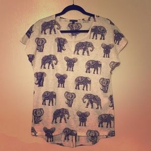 Super cute elephant top w/ slit in back.