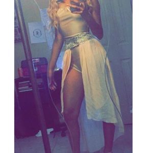 a tan/gold, light pink custom made one piece