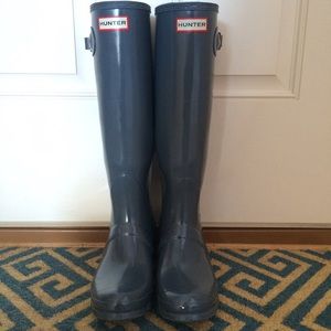 Tall shiny grey hunter boots