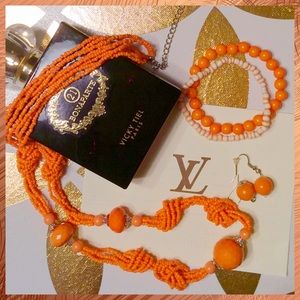 Orange beaded necklace, earrings and 2 bracelets💐