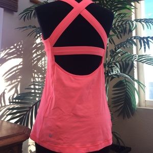 Lululemon orange fitness top.