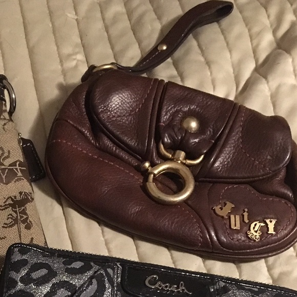 Juicy leather Wristlet.