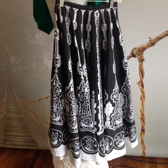 Mid calf, sequined cotton circle skirt.