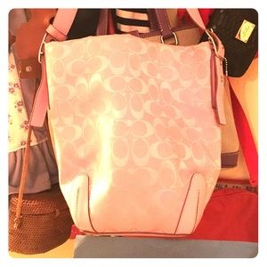Beautiful, adorable light pink embossed Coach bag!
