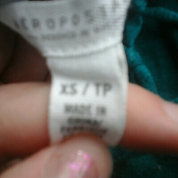 Turqoise cut-out tank top - Picture 3 of 3