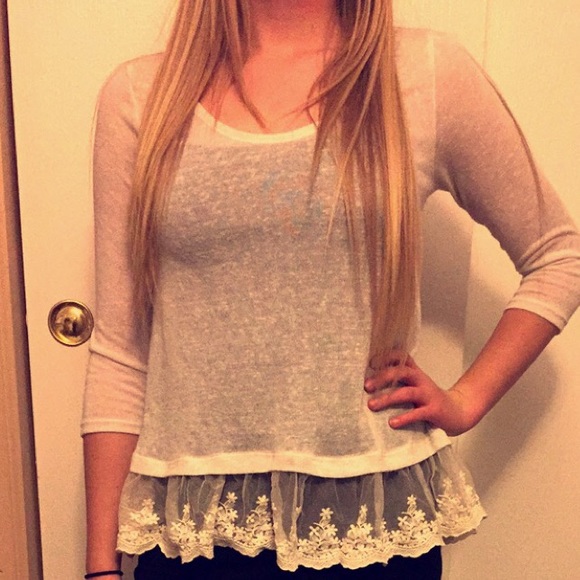 white, quarter length sleeve shirt.