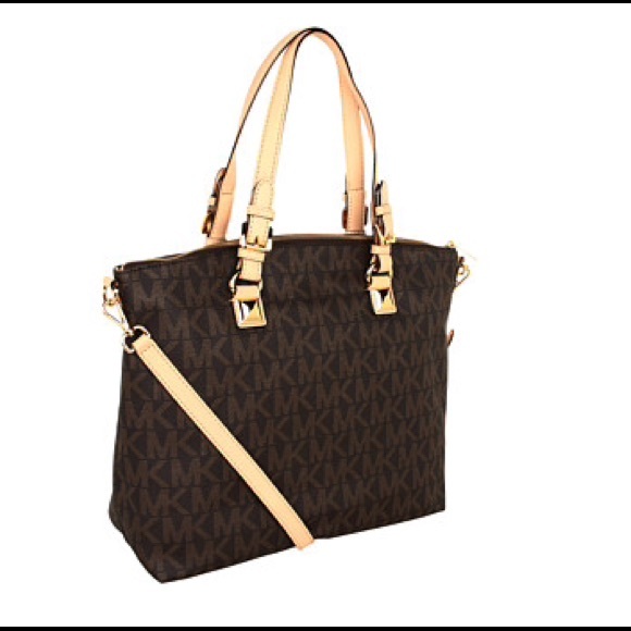 Micheal Kors Jet Set Multifunctional Satchel