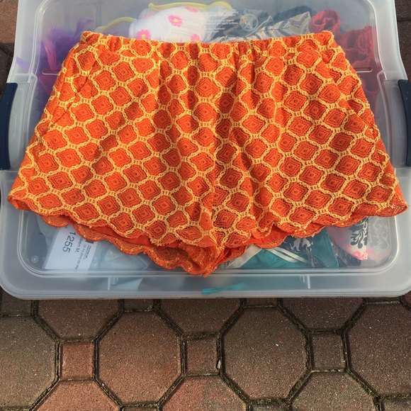 Orange and yellow scalloped crochet shorts