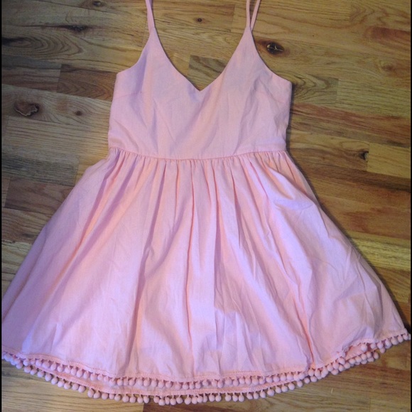 Pink dress with Pompom details