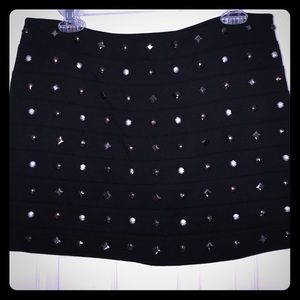 Black studded mini skirt
