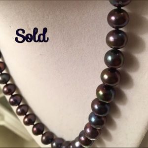 Extraordinarily beautiful set of black pearls