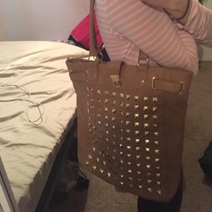 Large handbag with gold studded detailing