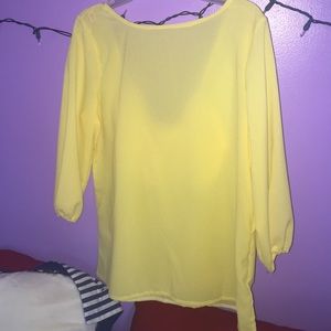 Yellow chiffon blouse with a bow back