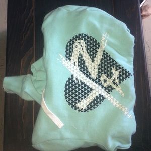 Young and reckless sweater ..