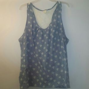 Blue tank top with white design and lace back
