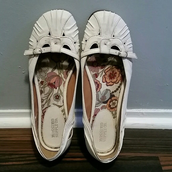 Off-white colored flats