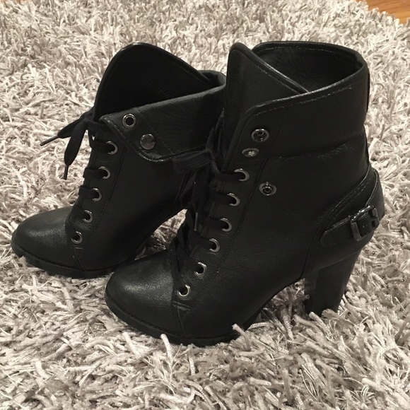 Black lace up booties.