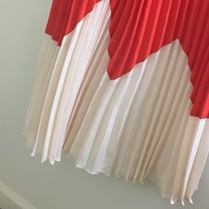 Pleated mini dress with color blocking