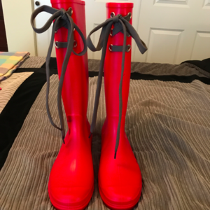Red rain boots with laces