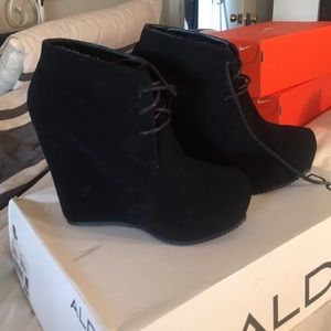 Tall black booties