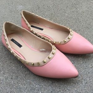 Pink flats with gold studs
