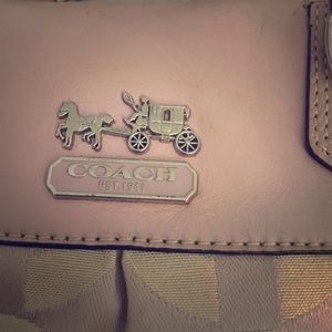 Lilac purse with gray inside with 2 ways to carry