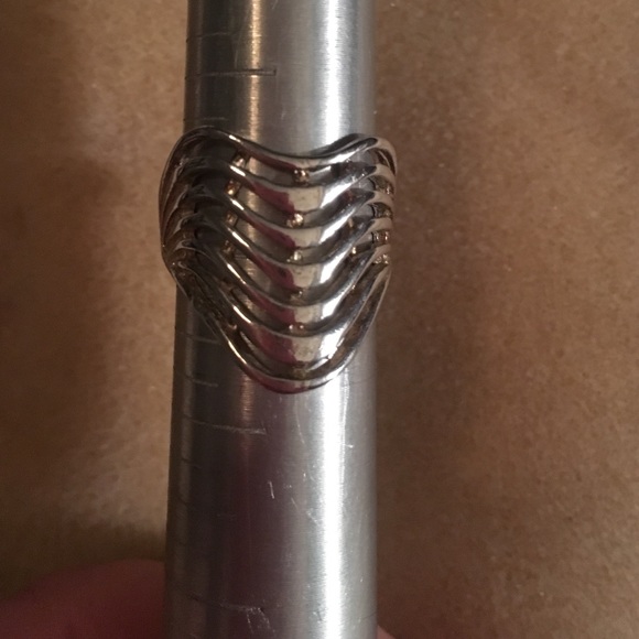 silver wave-v ring.
